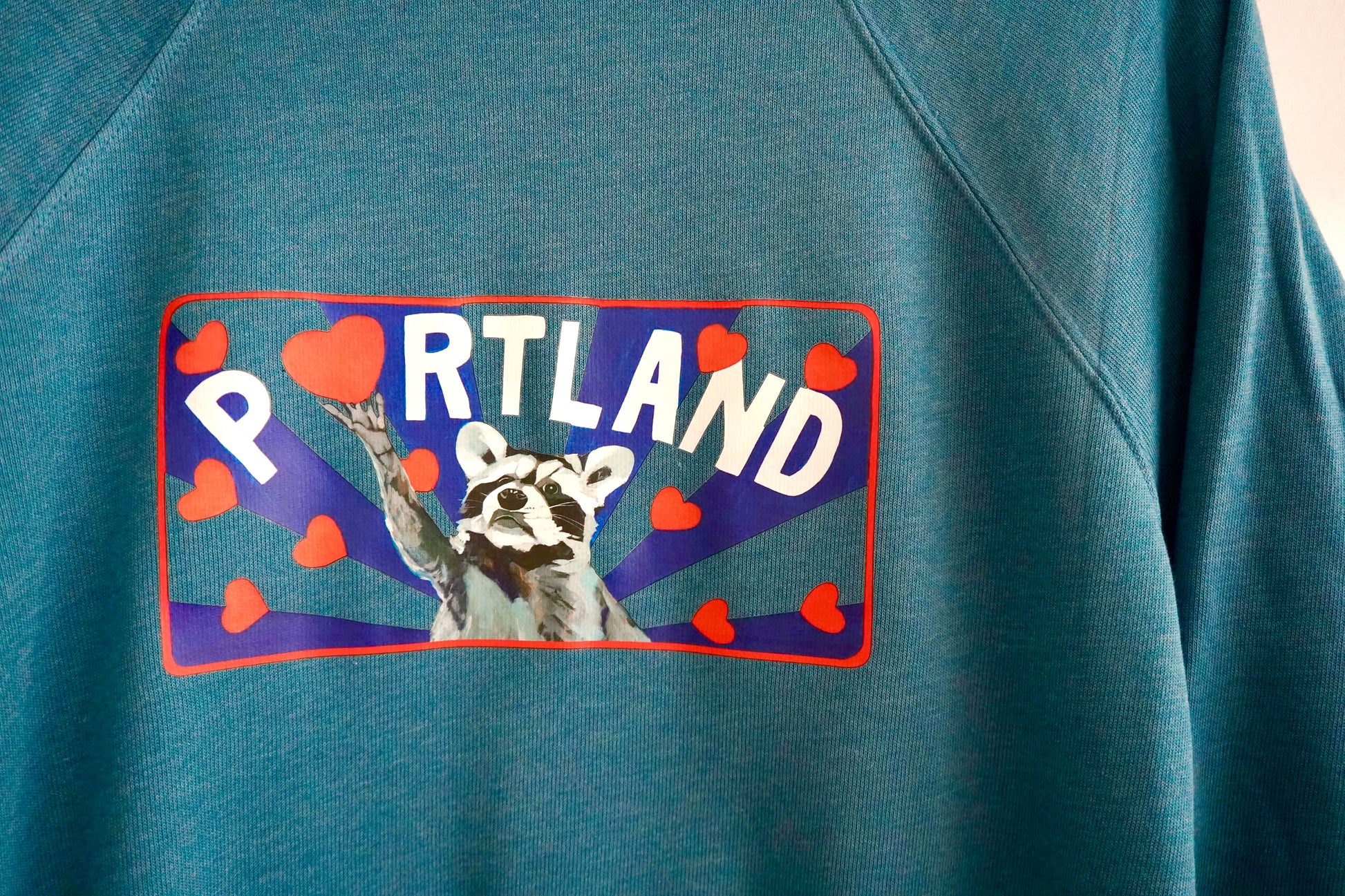 Portland Raccoon Teal Crewneck Sweatshirt FlynHats